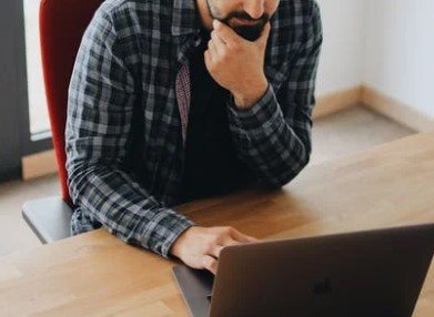 Man looking on computer